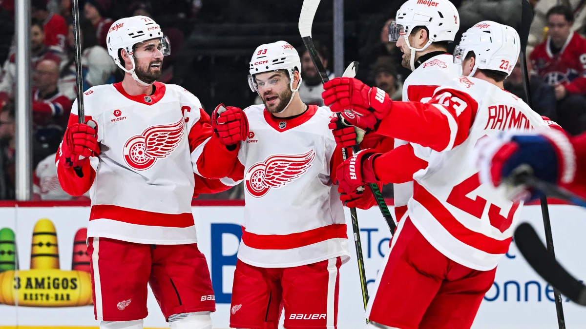 Detroit Red Wings center Dylan Larkin (71) celebrates with his teammates his goal against the Montreal Canadiens during the second period at Bell Centre.