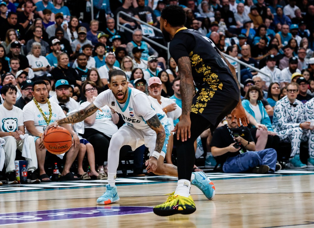 Brampton Honey Badgers' Roddy Peters (2) defends against Winnipeg Sea Bears' Xavier Moon (17) during first half CEBL championship action in Winnipeg on Saturday, Aug. 15, 2026. THE CANADIAN PRESS/John Woods