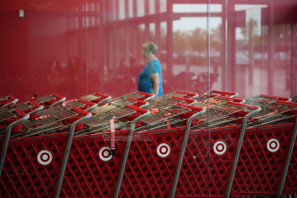 A shopper enters a Target store, Thursday, Aug. 13, 2026, in Woodbury, Minn. (AP Photo/Ellen Schmidt)