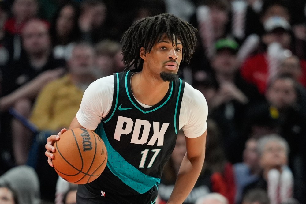 FILE - Portland Trail Blazers guard Shaedon Sharpe dribbles during the second half of an NBA basketball game against the Sacramento Kings, Sunday, April 12, 2026, in Portland, Ore. (AP Photo/Jenny Kane,File)