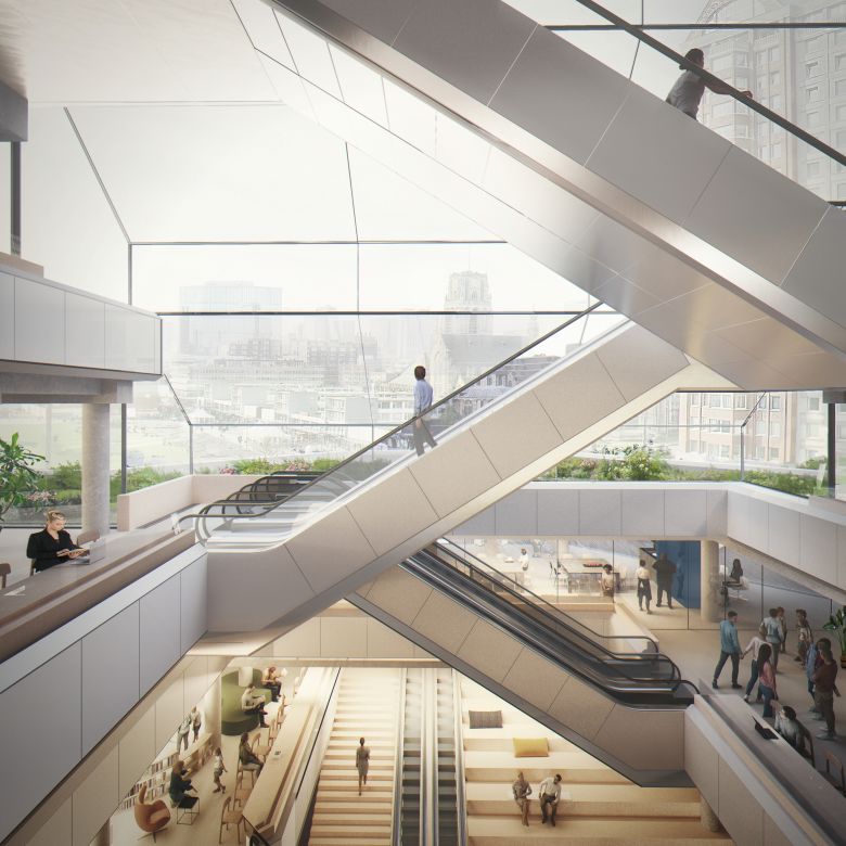 The renovation preserves the building’s iconic circulation routes while adding new ways to move, gather and connect, including timber staircases designed as informal meeting and seating areas.
