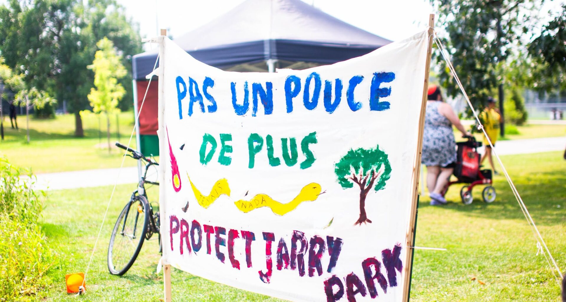 Montrealers rally against tennis stadium expansion in Jarry Park
