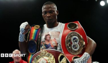 Zolani Tete with his world titles wraped around his waist and on his arms