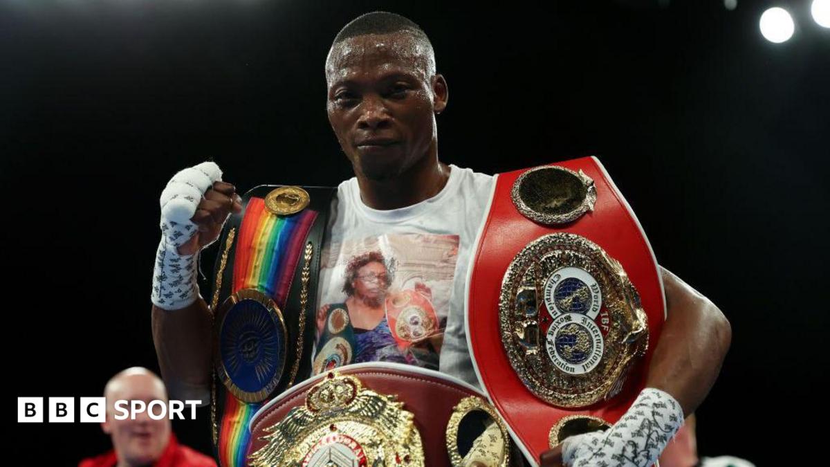 Zolani Tete with his world titles wraped around his waist and on his arms
