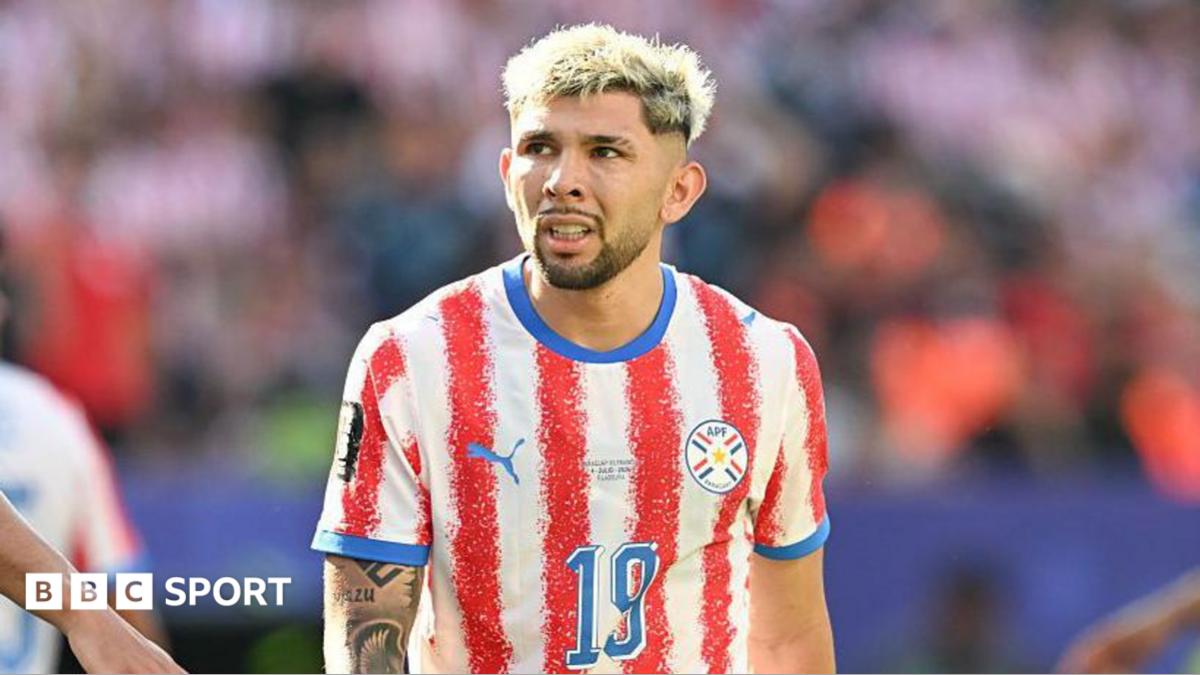 Julio Enciso on the pitch for Paraguay at the World Cup against France