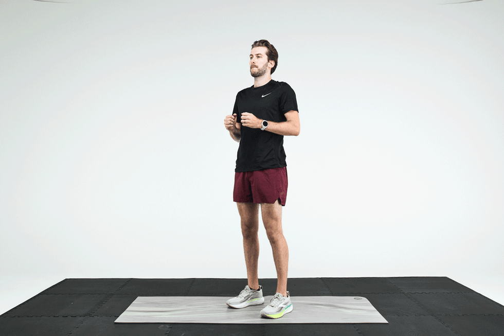 Person performing a workout on a mat, demonstrating fitness movements in athletic attire. Person performing a workout on a mat, demonstrating fitness movements in athletic attire.