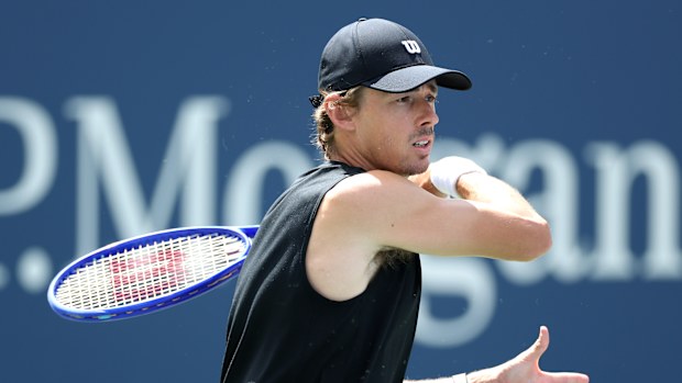 Alex De Minaur returns a shot in his practice
