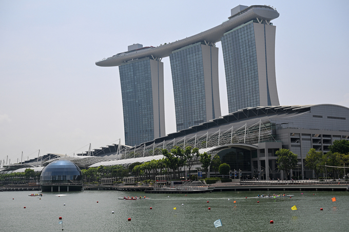 Rowers compete in an outrigger canoe race during the Singapore Vaa World Sprints Championships 2026 in Marina Bay in Singapore on August 18, 2026. Photo by AFP