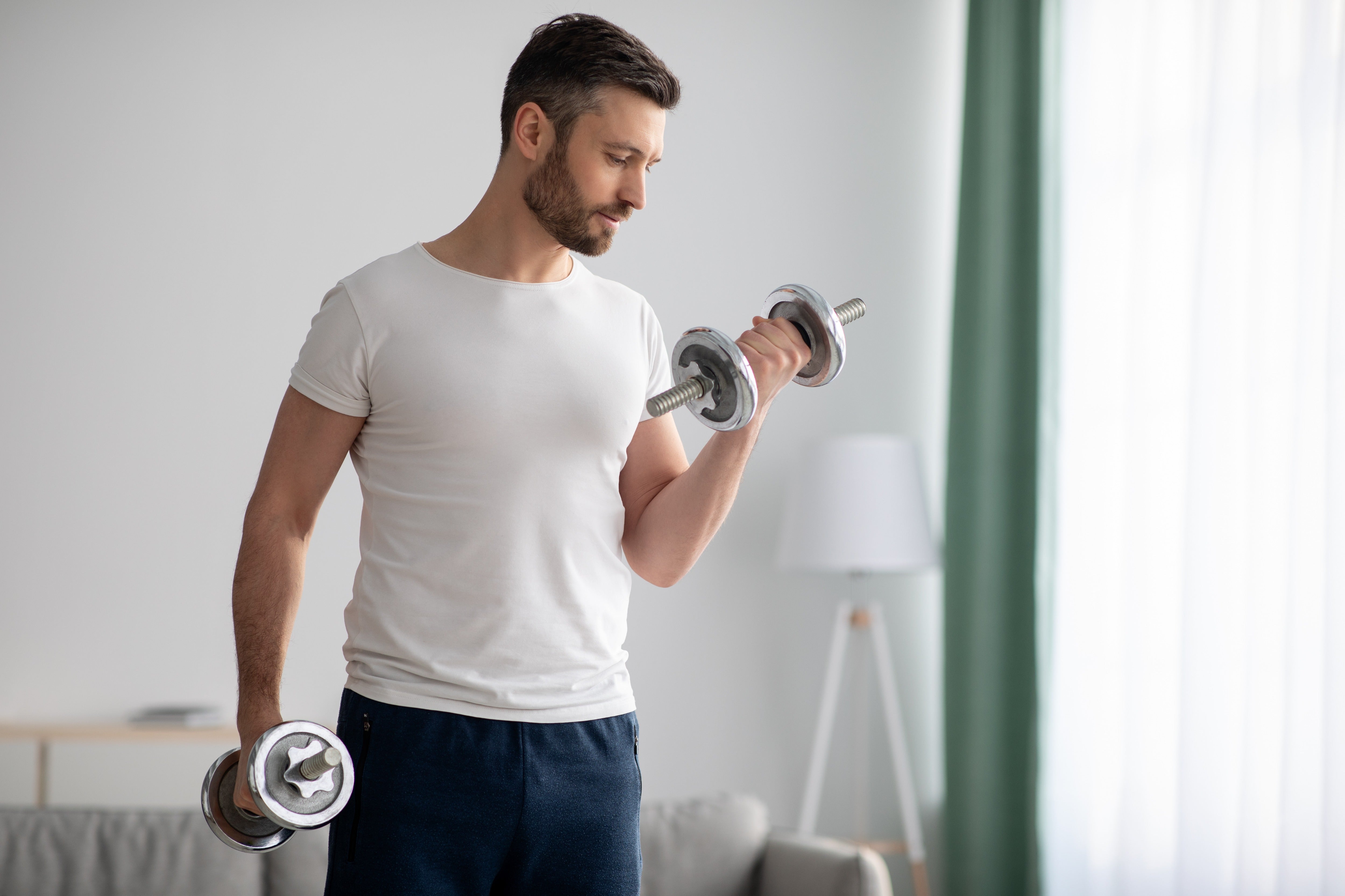 A couple of 20-minute dumbbell workouts each week can transform your health and fitness, according to muscle expert Dr Brad Schoenfeld