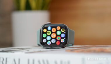 An Apple Watch Series 11 displays the updated app library.