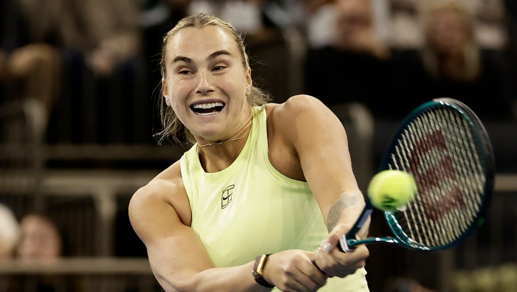 NEW YORK, NEW YORK - DECEMBER 08: Aryna Sabalenka in action against Naomi Osaka of Japan during the Garden Cup at Madison Square Garden on December 08, 2025 in New York City. (Photo by Adam Hunger/Getty Images)