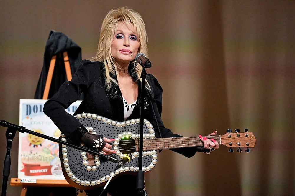 Dolly Parton appears at an event to celebrate the expansion of the Imagination Library of Kentucky at the Lyric Theatre in Lexington, Ky., on Aug. 27, 2024. (AP Photo/Timothy D. Easley, file)