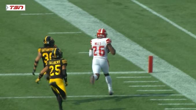 Dedrick Mills GW 49-yard run vs HAM SAT credit (screengrab CFL YouTube) Calgary Stampeders running back Dedrick Mills scores the game-winning 49-yard touchdown against the Hamilton Tiger-Cats. Credit (Screengrab/CFL YouTube)