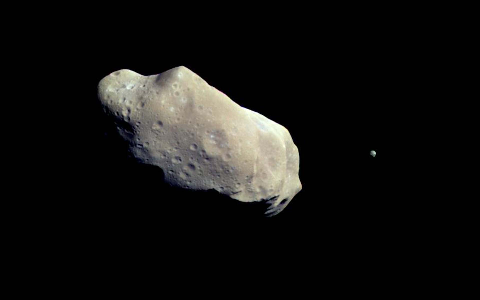 In the mid-1990s, the Galileo spacecraft, on its way to the Jupiter system, captured this mind-blowing image of asteroid 243 Ida and its moon, Dactyl.