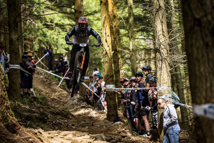 Evan Wall jumps in Tweed Valley EWS