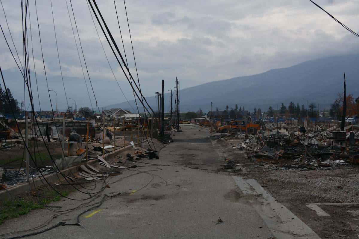 Wooden utility poles stand between wildfires and blackouts for remote communities
