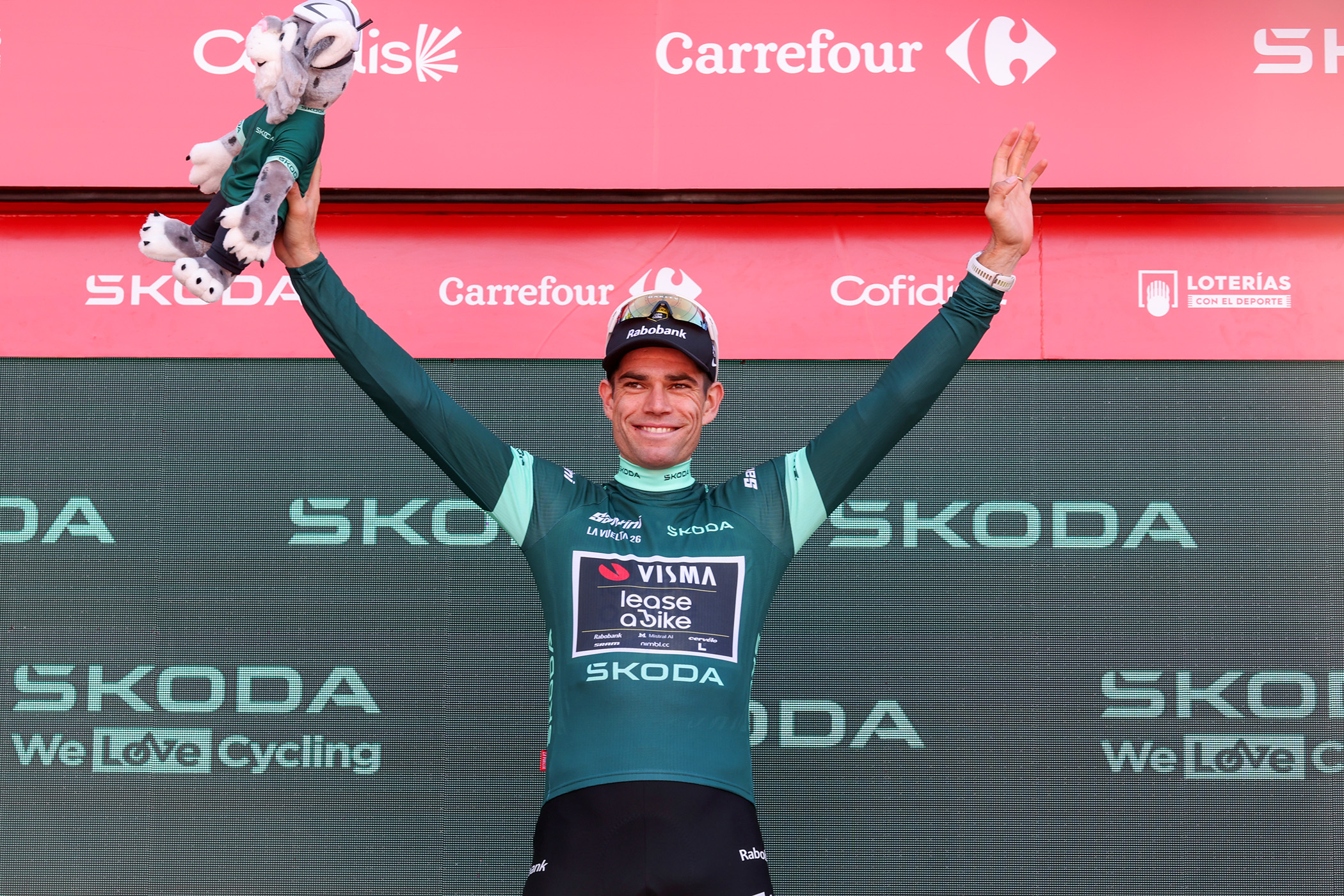 Wout van Aert on the podium in the green jersey after stage 8 of the Vuelta a Espa&ntilde;a