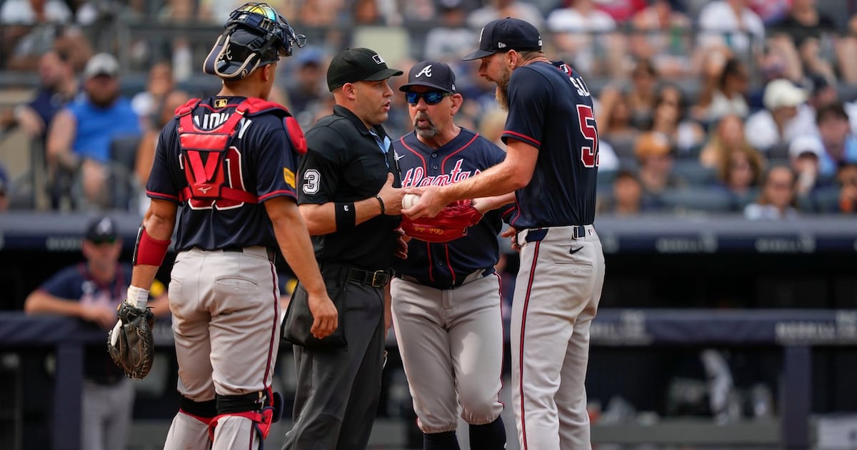 Atlanta Braves ace Chris Sale ejected by umpire Dan Merzel before start of game against New York Yankees