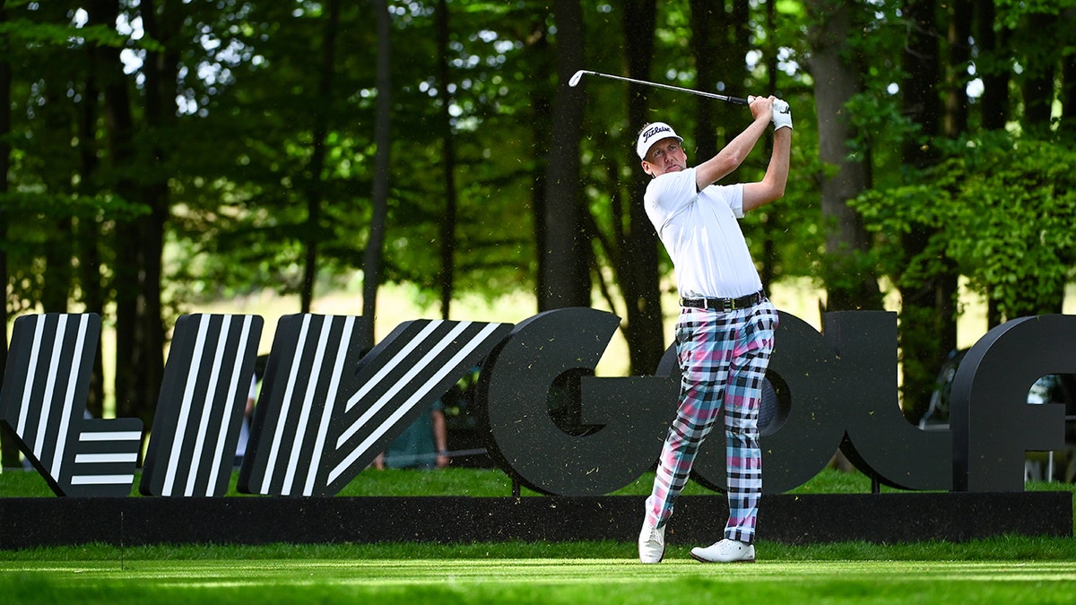 Ian Poulter tees off