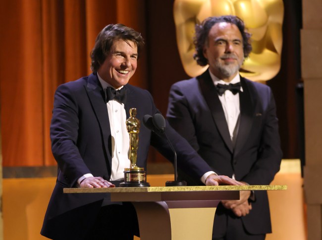 HOLLYWOOD, CALIFORNIA - NOVEMBER 16: (L-R) Tom Cruise accepts an Academy Honorary Award from Alejandro González Iñárritu onstage during the 16th Governors Awards at The Ray Dolby Ballroom on November 16, 2025 in Hollywood, California. (Photo by Kevin Winter/Getty Images)