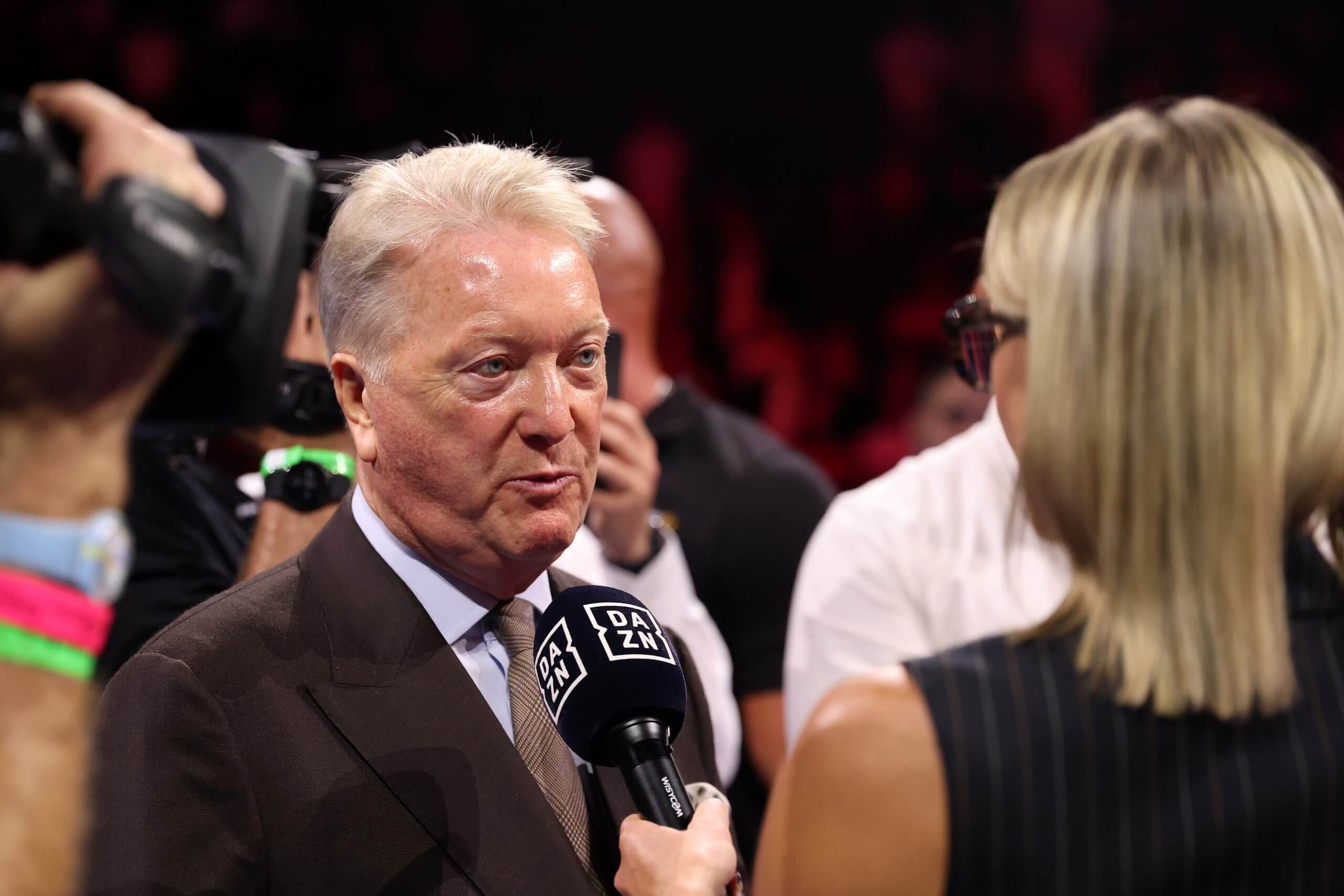 Frank Warren is interviewed in the ring after the bout