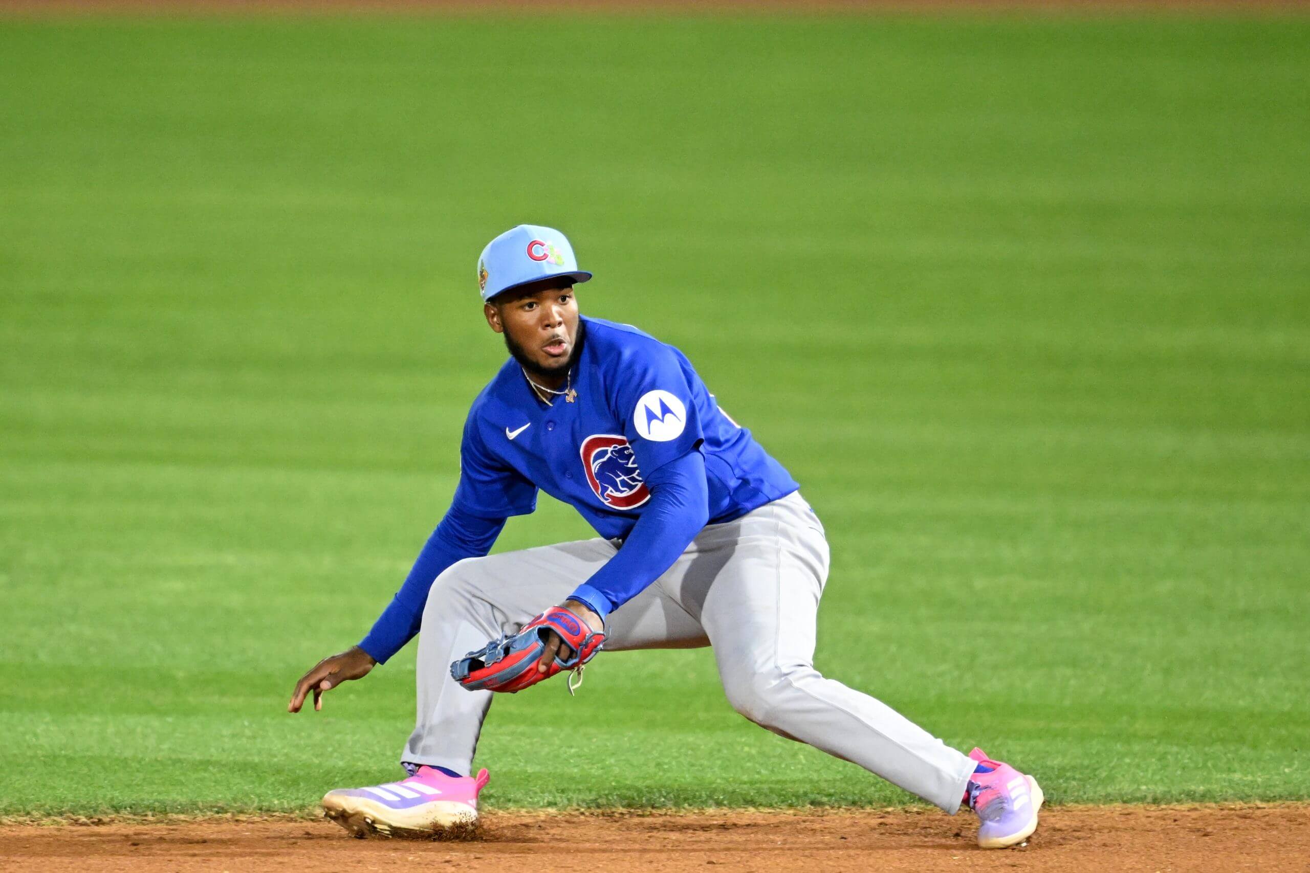 Jefferson Rojas #93 of the Chicago Cubs fields a ground ball during the sixth inning of a spring training game against the Cleveland Guardians at Goodyear Ballpark on March 16, 2026 in Goodyear, Arizona.