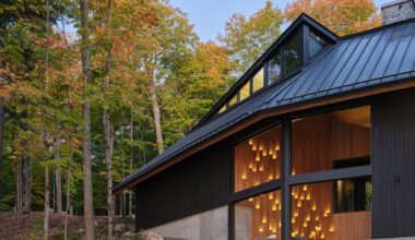 With a zinc roof, cathedral ceilings and stone hearth, this family cottage is built for awe