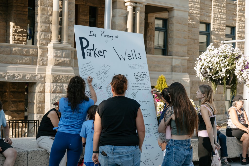 Temporary memorials for Parker Wells removed by the City of Calgary