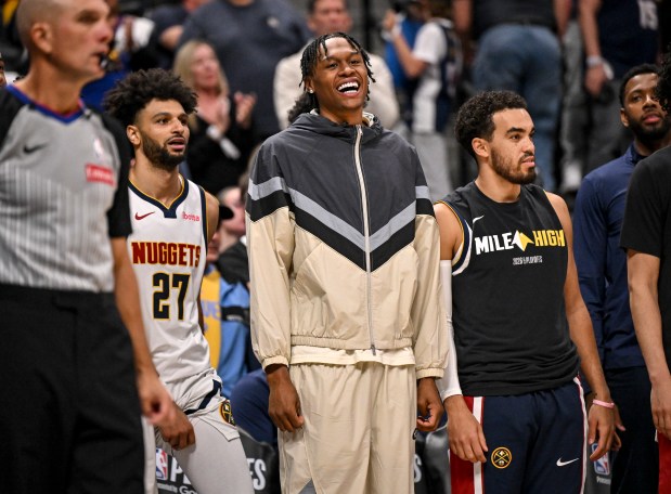 Peyton Watson (8) of the Denver Nuggets smiles during the fourth quarter of the Nuggets' 116-105 win over the Minnesota Timberwolves at Ball Arena in Denver on Saturday, April 18, 2026. The Nuggets took a 1-0 lead in their best-of-seven series. (Photo by AAron Ontiveroz/The Denver Post)