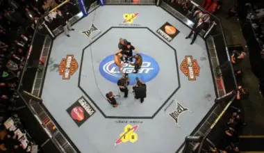 Joshua Van flexes at the ceremonial weigh-ins ahead of UFC 323