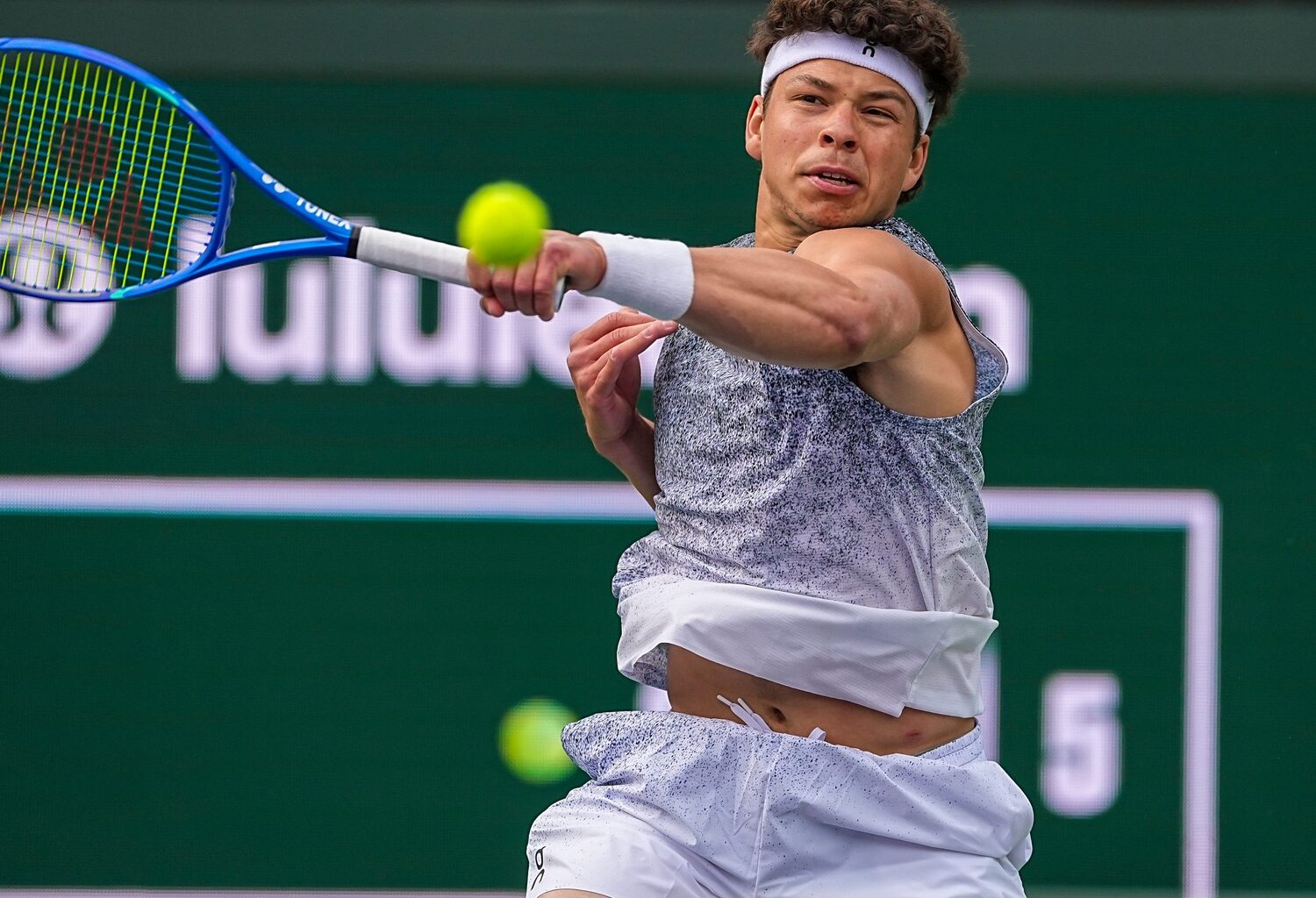 Ben Shelton hits a forehand against Reilly Opelka at the 2026 BNP Paribas Open in Indian Wells.