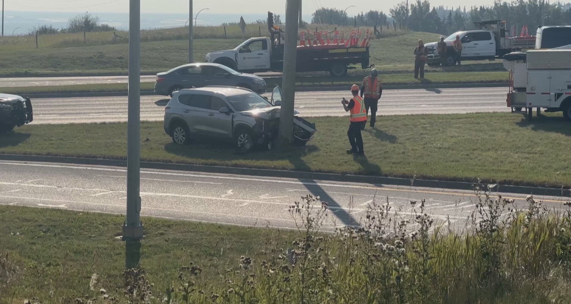 Vehicle crashes into power pole in NW Calgary