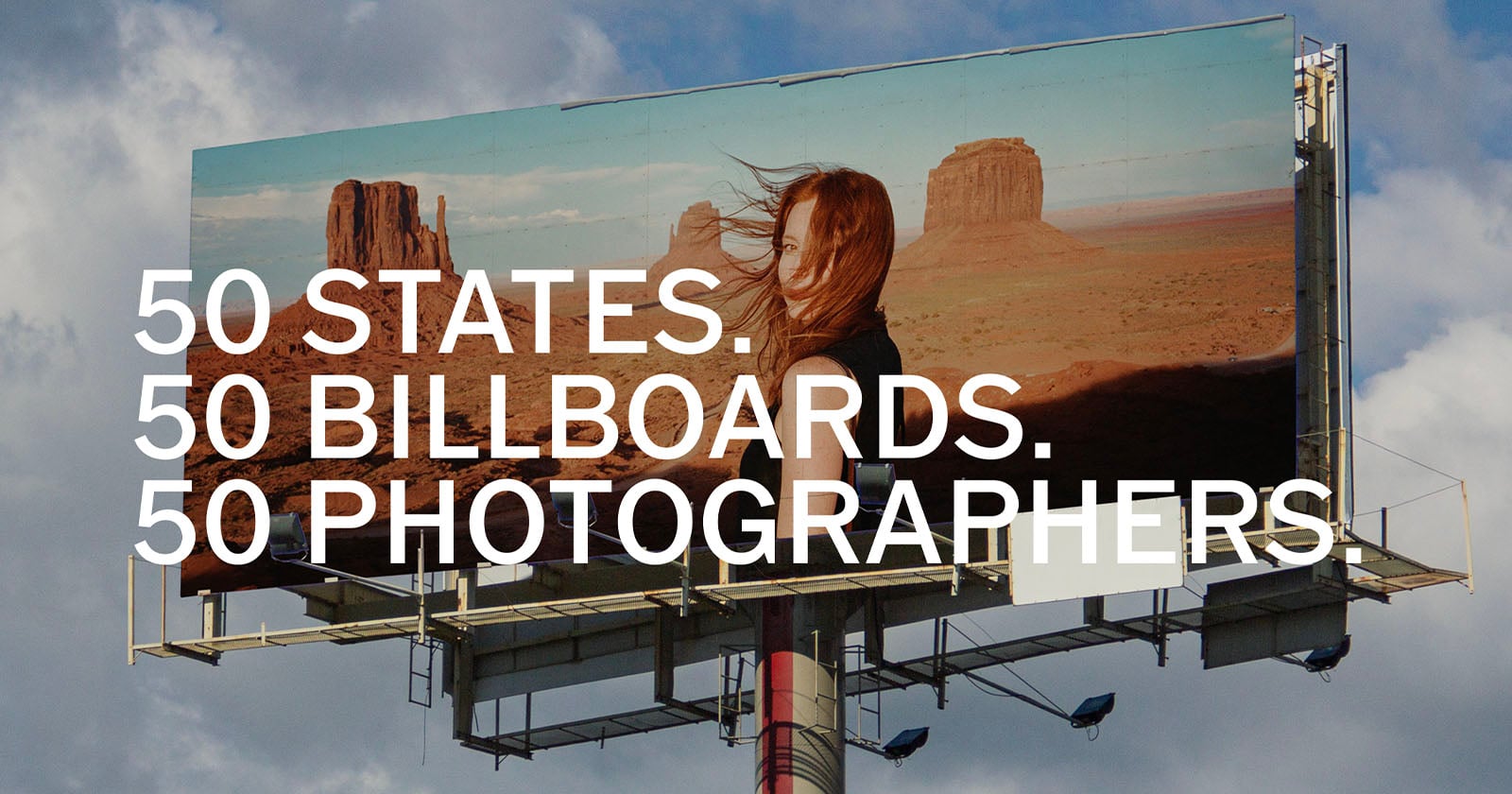 A large outdoor billboard against a cloudy sky features a woman with windblown hair standing in front of a desert landscape, with the text "50 STATES. 50 BILLBOARDS. 50 PHOTOGRAPHERS." overlaid.