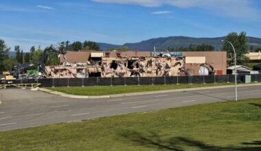 Crews operate heavy machinery as work gets underway to demolish Tumbler Ridge Secondary School in northern B.C., in an undated handout photo. The school was the site of a deadly shooting earlier this year. THE CANADIAN PRESS/Handout — Stu Bell (Mandatory Credit)