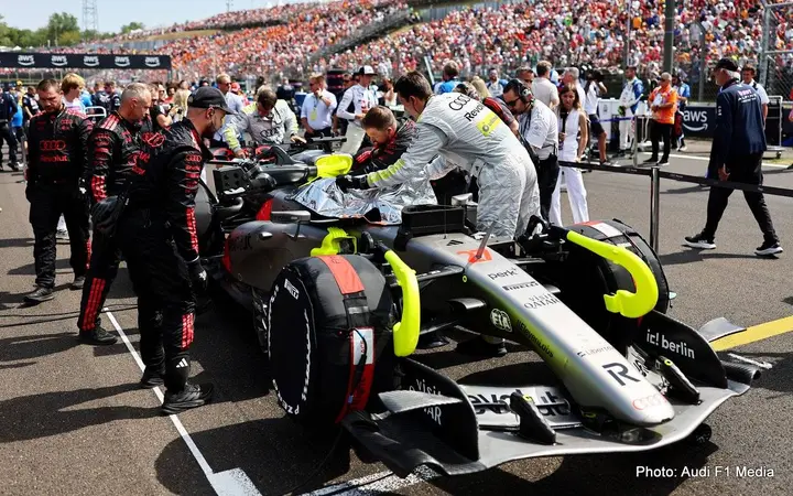 BUDAPEST, HUNGARY - JULY 26: Mechanics on the grid with the car of Nico Hulkenberg of Germany and Audi F1 Team prior to the F1 Grand Prix of Hungary at Hungaroring on July 26, 2026 in Budapest, Hungary. (Photo by Andy Hone/LAT Images)