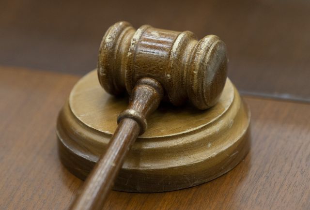 A Saskatchewan fast food restaurant has pleaded guilty to charging a foreign worker an employment fee to retain their job. In this file photo, a gavel sits on a desk before the a meeting of the House Justice and Human Rights Committee in Ottawa, Wednesday February 13, 2019. THE CANADIAN PRESS/Adrian Wyld