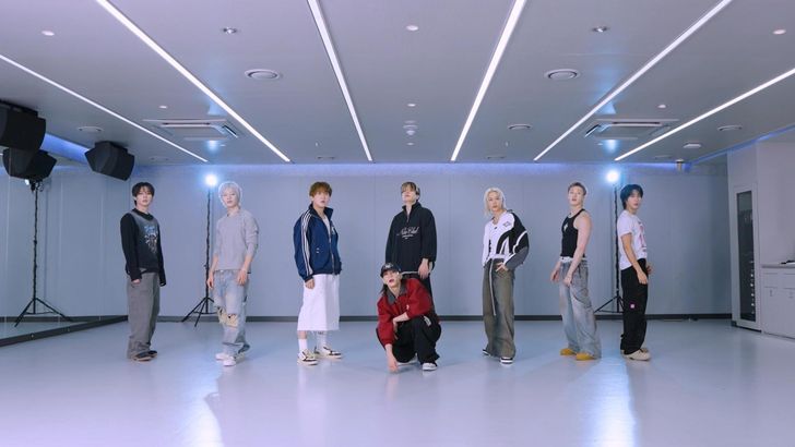 Stray Kids appear in a dance practice video for 'THIS & THAT' in this image captured from YouTube. Researcher Dominique Falla points to this kind of low-cost, high-volume content, produced as a by-product of ordinary working days, as a component of the K-pop system that artists elsewhere struggle to reproduce. Courtesy of JYP Entertainment