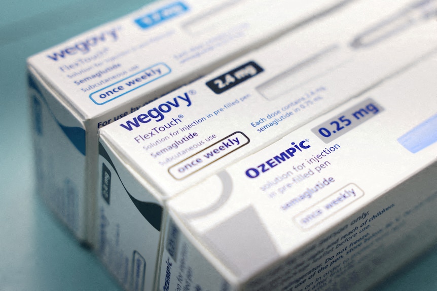 Two boxes of medication side by side, labelled Ozempic and Wegovy