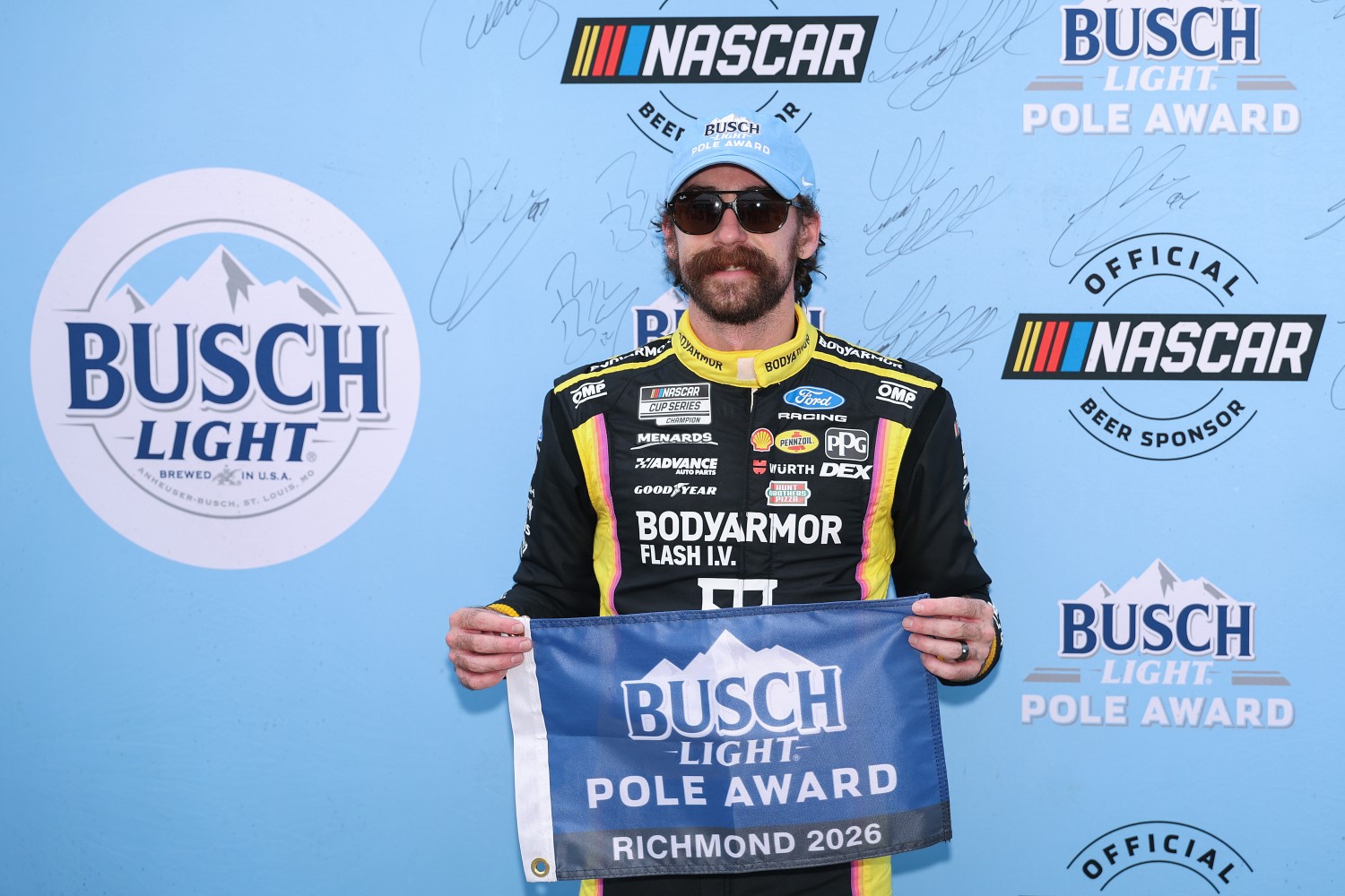 Ryan Blaney, driver of the #12 BODYARMOR FLASH I.V. Ford, poses for photos after winning the pole award during qualifying for the NASCAR Cup Series Cook Out 400 at Richmond Raceway on August 14, 2026 in Richmond, Virginia. (Photo by David Jensen/Getty Images for NASCAR)