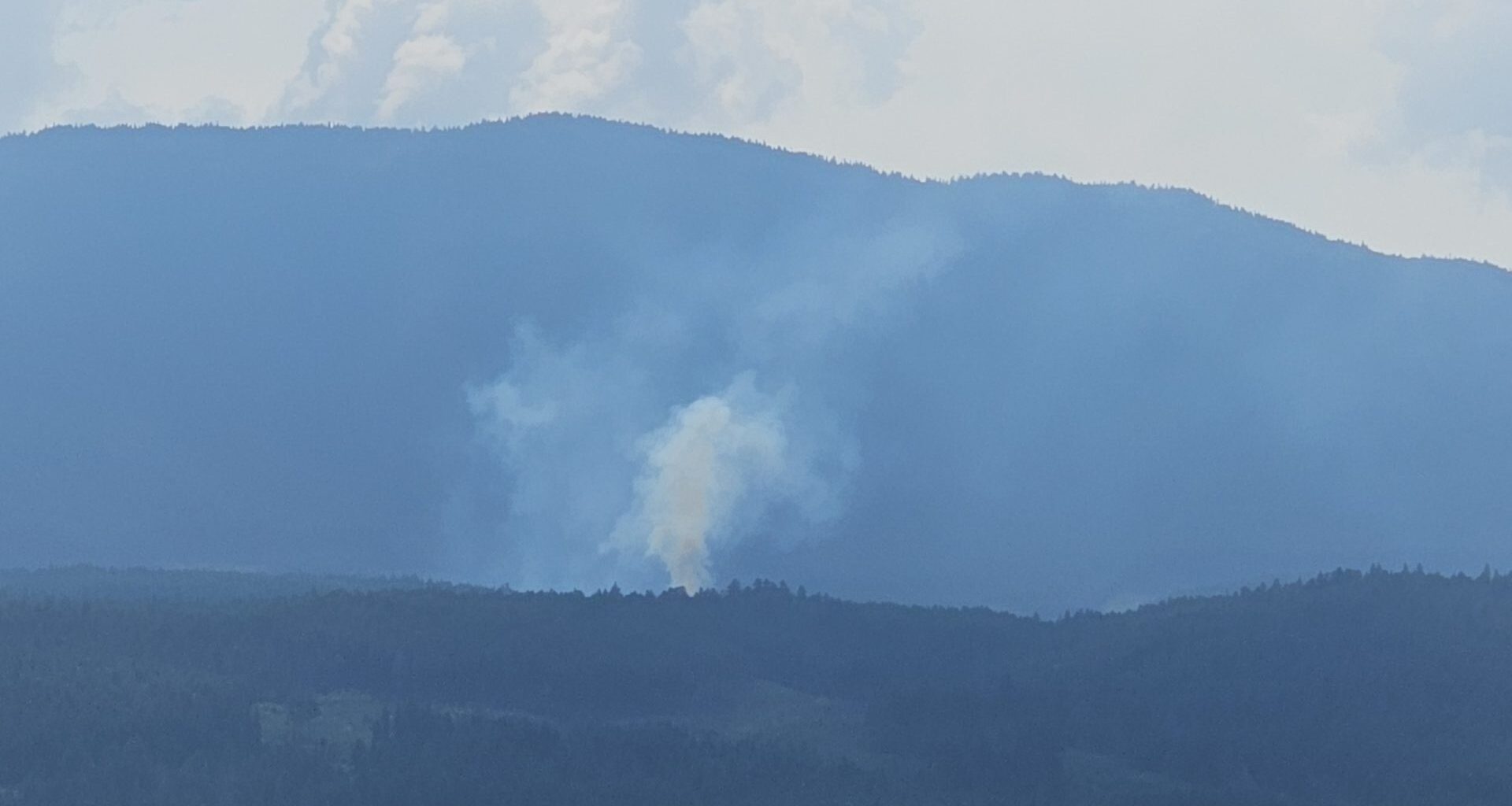 Smoke visible as new human-caused wildfire burns out of control near Fanny Bay