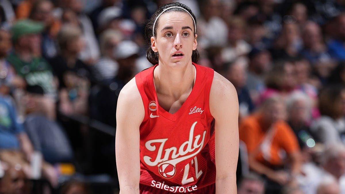 Caitlin Clark #22 of the Indiana Fever looks on during a game against the Minnesota Lynx.