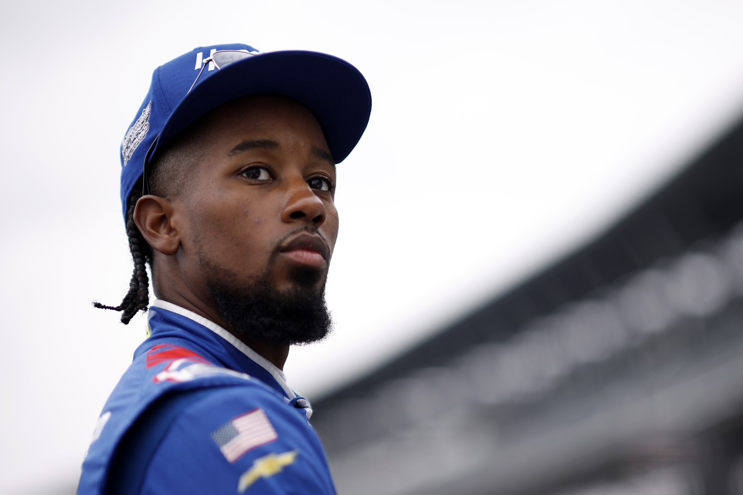 Rajah Caruth, driver of the #32 HendrickCars.com Chevrolet, looks on during qualifying for the NASCAR O'Reilly Auto Parts Series Pennzoil 250 Presented by Take 5 Oil Change at Indianapolis Motor Speedway on July 25, 2026 in Indianapolis, Indiana. (Photo by Sean Gardner/Getty Images)