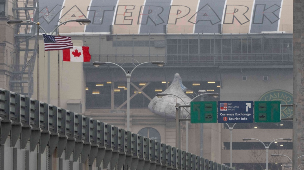 US hits Canada with 50% tariffs and Carney vows to retaliate