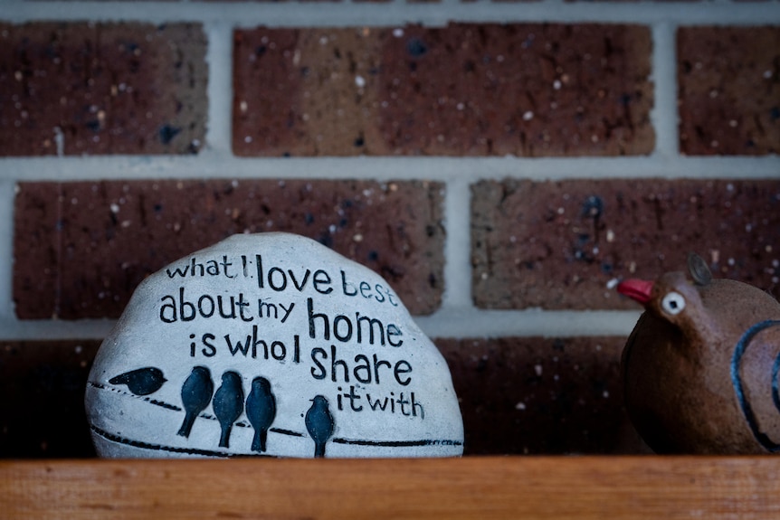 Home decorations on a shelf.
