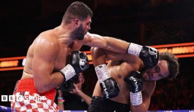 Filip Hrgovic has the IBF heavyweight title around his waist and holds up his fists