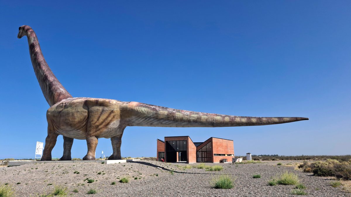 Trelew, Argentina, February 01, 2025: A replica of a Patagotitan mayorum dinosaur is located at the entrance to the city. This species, discovered in the region, is considered the largest in the world