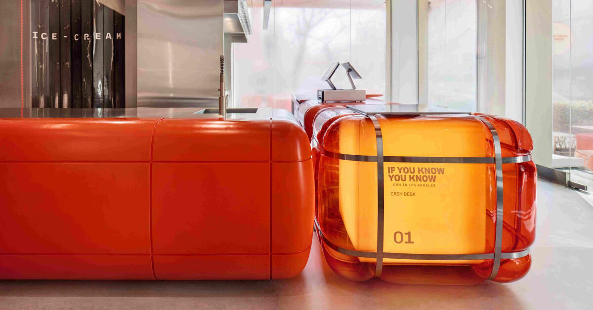 inflated orange volumes adorn smash burger restaurant’s interior by da bureau