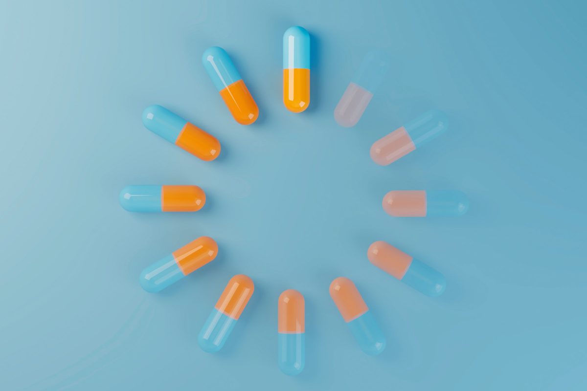 Digital loading symbol with medicine pills, flat lay. (3d render)
