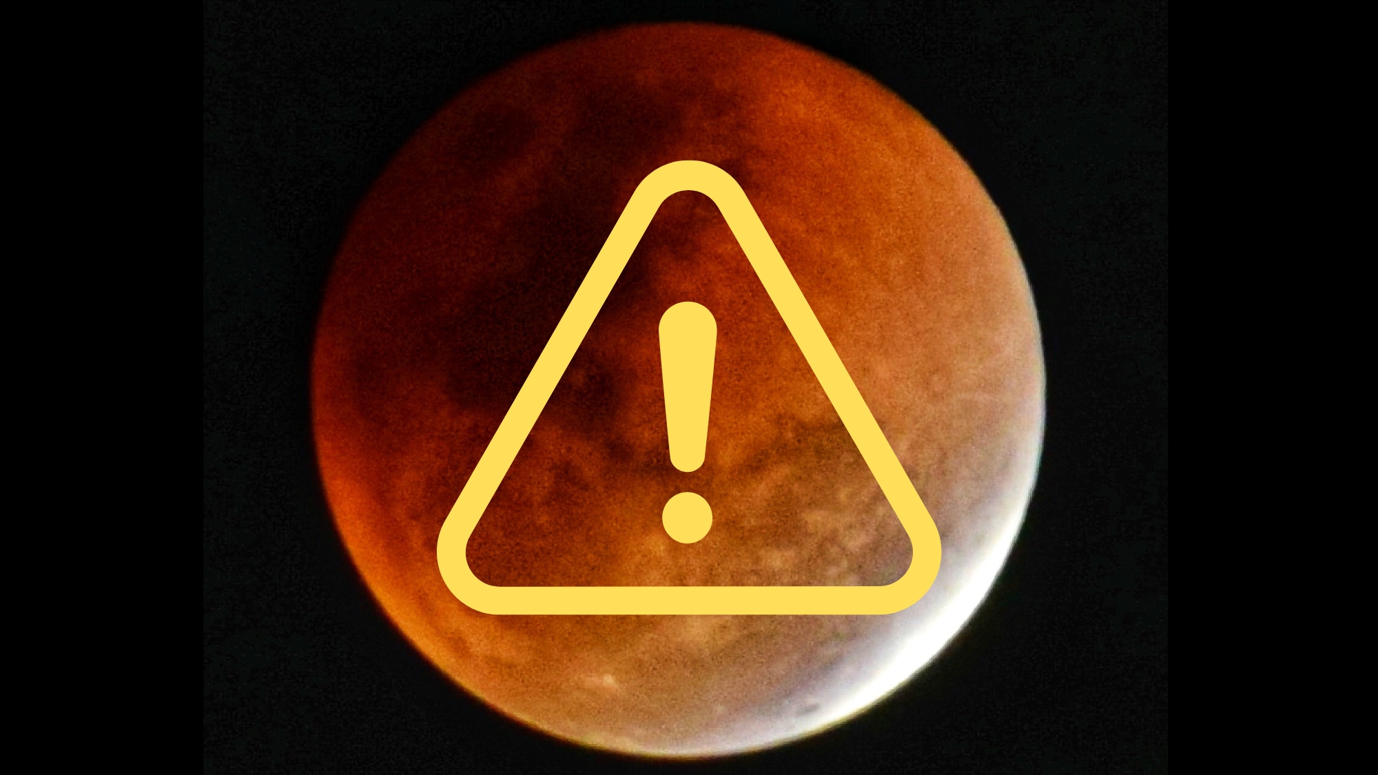 graphic showing a blood red moon during a lunar eclipse with a small portion of the moon still illuminated bright white. there is a yellow exclamation mark within a triangle graphic in the foreground.