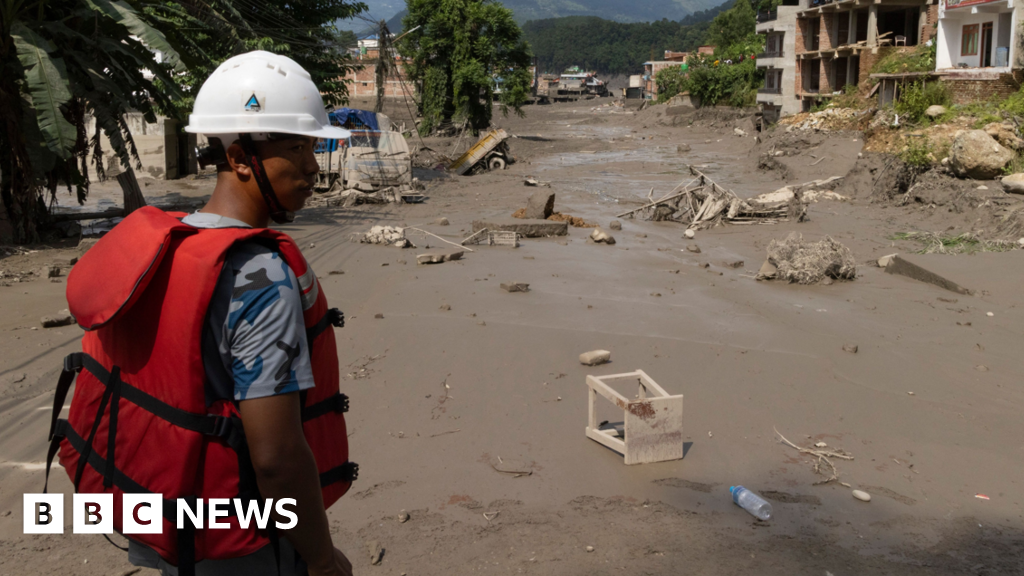 Dozens of US and Canadian citizens missing after flash flooding in Nepal - BBC